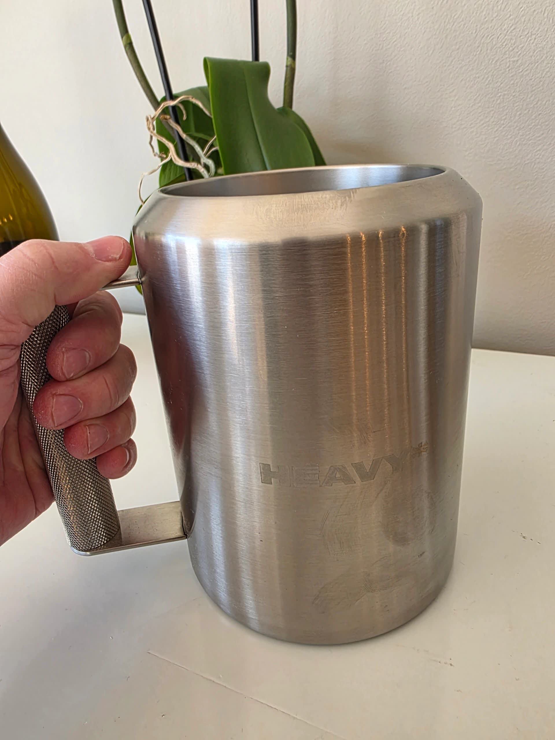 The 22-pound Heavy mug on a kitchen counter